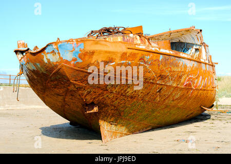 A rusting shipwreck  on the banks of the Bideford Bay, Taw and Torridge river estuary, North Devon, UK. Stock Photo