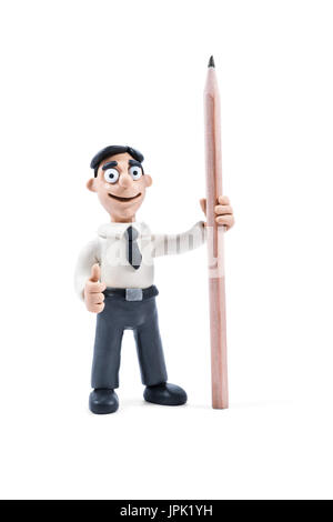 Plasticine businessman holding a big pencil and showing a thumbs up isolated on white background Stock Photo