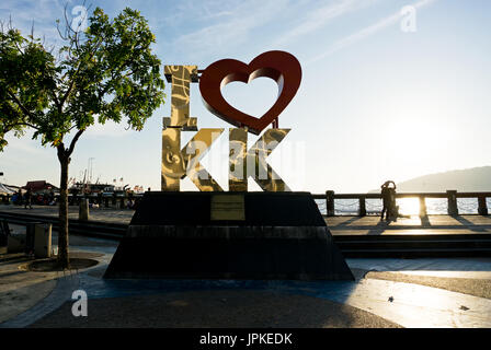 Kota Kinabalu, Malaysia - August 01, 2017: Back lit of the new landmark 'I LOVE KK' at sunset.The city’s new landmark at Segama Waterfront built to fu Stock Photo