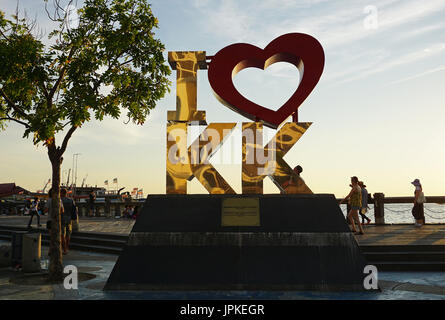 Kota Kinabalu, Malaysia - August 01, 2017: Back lit of the new landmark 'I LOVE KK' at sunset.The city’s new landmark at Segama Waterfront built to fu Stock Photo