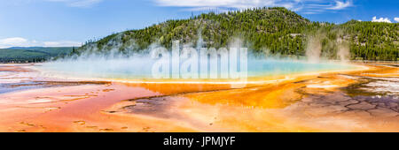The vivid rainbow colors of the Grand Prismatic Spring in Yellowstone National Park, Wyoming.  Panoramic