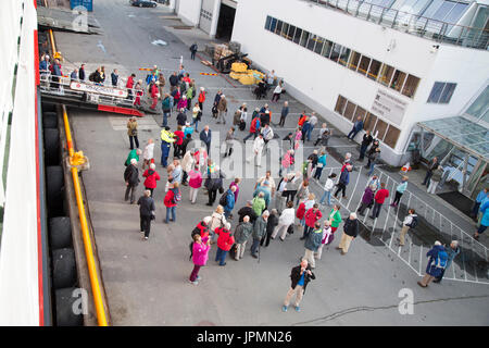 Passengers disembarking on quayside, Nordlys Hurtigruten ferry ship, Svolvaer, Lofoten Islands, Nordland, Norway Stock Photo