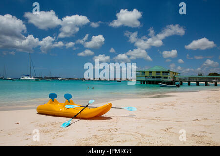 Pebbles Beach. Pebbles beach is a public beach on Carlisle Bay in the parish of St Michaels, Barbados. On the west coast, looking across to the capita Stock Photo