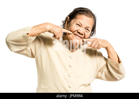 portrait of a senior woman smiling. Isolated on white background with copt space and clipping path Stock Photo