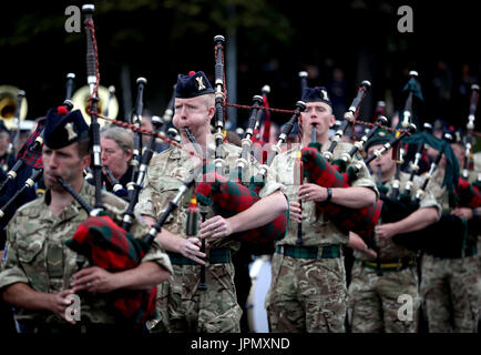 Members of the Royal Regiment of Scotland (2 SCOTS) massed pipes and drums during the rehearsal for The Royal Military Edinburgh Tattoo at Redford Barracks, Edinburgh. Stock Photo