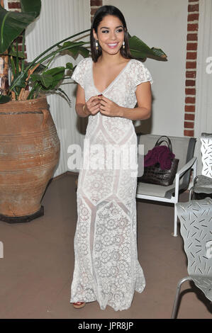 Vanessa Hudgens accepting on behalf of UNICEF Philippines, the $100,000