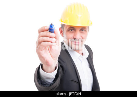 Selective focus of architect wearing hardhat writing with marker and smiling isolated on white background Stock Photo