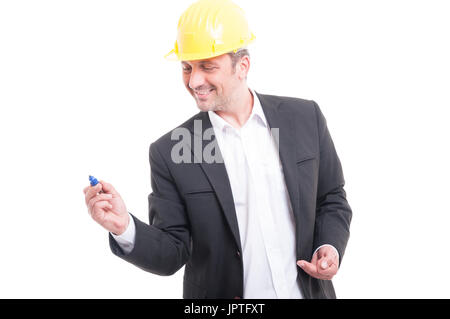 Selective focus of architect wearing hardhat writing with marker and smiling isolated on white background Stock Photo