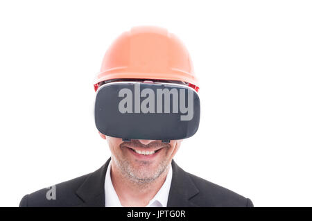 Portrait of foreman wearing yellow hardhat and vr goggles smiling isolated on white background Stock Photo