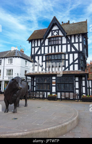 The Old black and white house Hereford built in 1621 standing proud alongside the towns world famous Hereford Bull Stock Photo