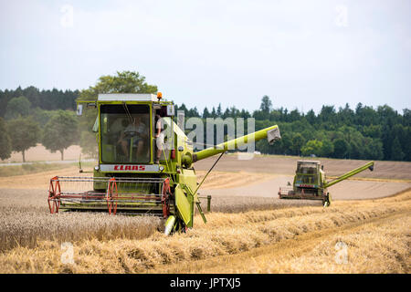 Combine Harvester - Wheat Crop, Bavaria Germany Stock Photo