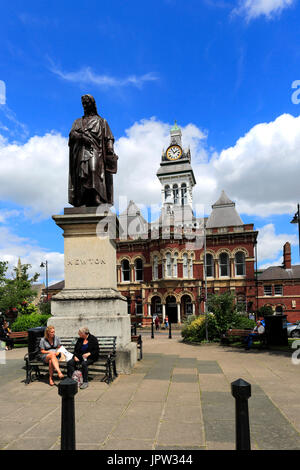 Statue of Sir Issac Newton and the Guildhall, Town hall of Grantham, Lincolnshire, England, UK Stock Photo