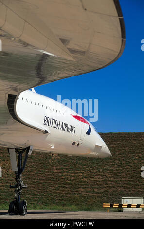 leading-edge of the wing and nosewheel undercarriage of a British Airways Aerospatiale BAC Concorde parked Stock Photo