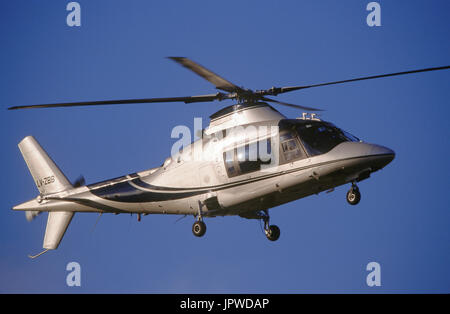 Agista A109C flying enroute Stock Photo