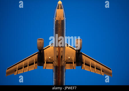 GE CF6-80C2A5 engine cowlings of an American Airlines Airbus A300-600R climbing enroute at dusk Stock Photo