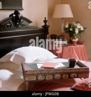 Tray on bed Stock Photo