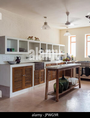 White kitchen with wooden cupboards Stock Photo