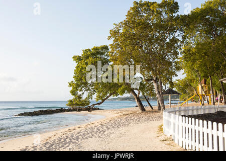 Almond Beach. Almond Beach is a public beach just north of Speightstown on the west coast of Barbados. The image shows how close to the beach the reso Stock Photo