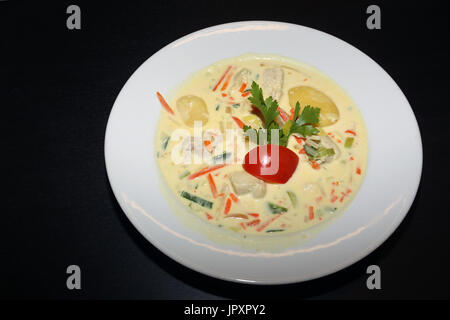 Chicken waterzooi or chicken stew from Ghent Flanders, Belgium. A traditional Flemish dish. Stock Photo