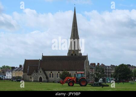 London, UK  3rd August 2017.Tractor out mowing Blackheath. :Credit claire doherty Alamy/Live News. Stock Photo