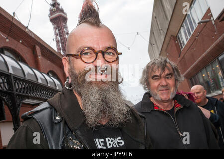 Blackpool, Lancashire, UK. 3rd August, 2017. Rebellion Festival world's largest punk festival begins as thousands of punks arrive in Blackpool for international punk festival. At the beginning of August, Blackpool’s Winter Gardens plays host to a massive line up of punk bands for the 21st edition of Rebellion Festival. There’s a fringe fest running alongside the main event. Called “At the Edge” with an art exhibition, vintage clothing and a dedicated Dr Martens stall. Credit; MediaWorldImages/AlamyLiveNews. Stock Photo