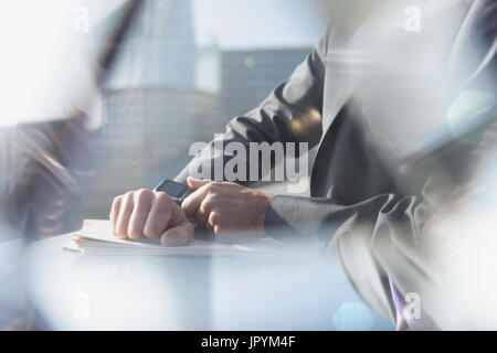 Businessman checking smart watch Stock Photo