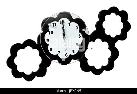 Black and white wall clock with three photo frames set. Stock Photo