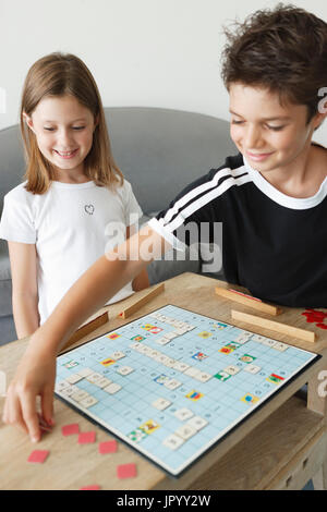 Two boys play board game hi-res stock photography and images - Alamy