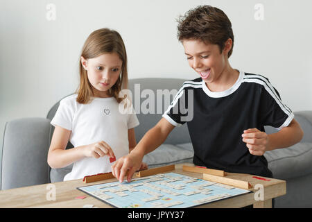 Two boys play board game hi-res stock photography and images - Alamy