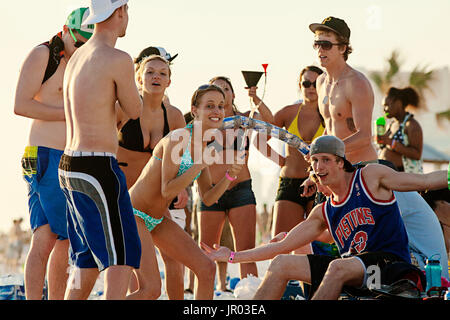 Students on spring breakon Panama City Beach, Florida. Stock Photo