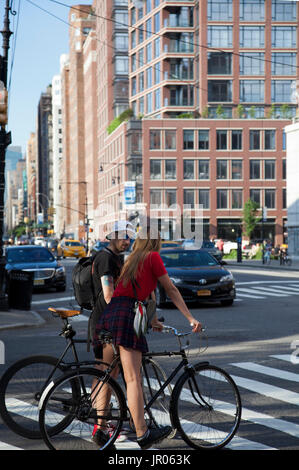 Cyclists on 7th Avenue South in The Village, NY - USA Stock Photo