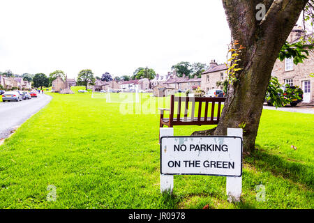 No parking on the green sign, no parking sign, West Burton, Yorkshire, UK, England, West Burton village green, West Burton village, village green, Stock Photo