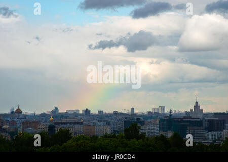 MOSCOW, RUSSIA - June 1, 2017: Beautiful and large sky with clouds and rainbow over downtown Moscow Stock Photo