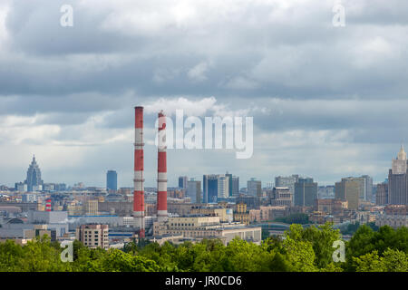 MOSCOW, RUSSIA - JUNE 2, 2017: Cityscape with TPP-12 of OAO 'Mosenergo' and residential buildings along the waterfront of the Moscow river Stock Photo