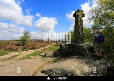 Walker at the Wellington Monument dedicated to the Duke of Wellington, Baslow Edge; Derbyshire County; Peak District National Park; England; UK Stock Photo