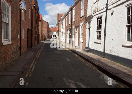 a residential street in york with new buildings under a blue summer sky Stock Photo