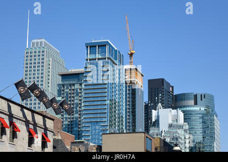 Montreal, Canada - August 1, 2017: Modern condo buildings and the tall business skyscrapers in the heart of Montreal downtown. Stock Photo