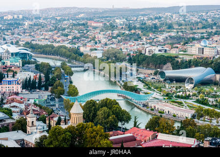 Tbilisi, The Capital And The Largest City Of Georgia, With Bridge Of Peace, Tubular Concert Hall Building And Mushroom-Like Justice House Stock Photo