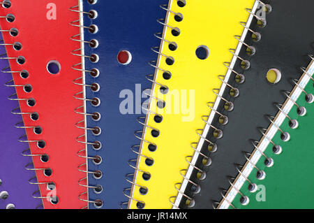 Spiral Notebooks in a stack on a white background Stock Photo