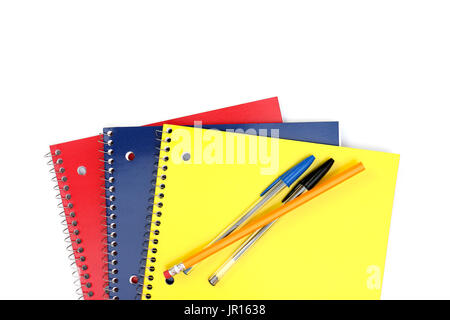 Spiral Notebooks in a stack on a white background Stock Photo