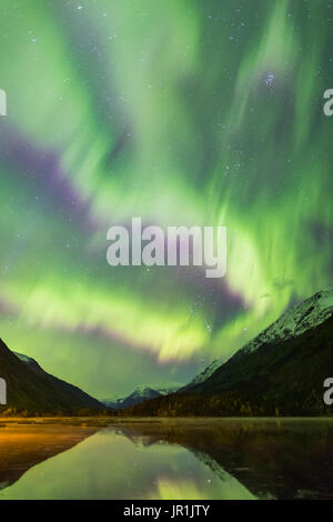 Northern Lights Dance Over Tern Lake And The Kenai Mountains, Southcentral Alaska, USA Stock Photo