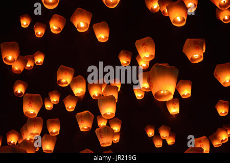 Thousands of lanterns fill the sky at the 2017 Pingxi Sky Lantern Festival in Taiwan, the Chinese text on them says chengzhang, which means to grow Stock Photo