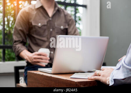 Business meeting  in outdoor. documents account managers crew working with new startup project Idea presentation, analyse marketing plans. Stock Photo