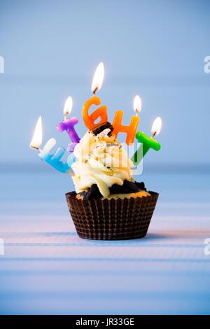Birthday's cake - cupcake with a candles for 8 - eighth birthday . Happy birthday ! Stock Photo