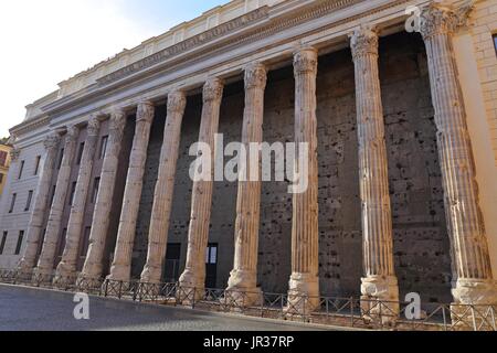 Part of a surviving wall on the Temple of Hadrian in Rome Italy Stock Photo