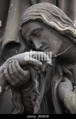 Cobweb on the statue of Saint Mary Magdalene kissing the left hand of the Dead Christ. Detail of the sculptural group Pieta by German-Czech Neoclassical sculptor Emanuel Max (1859) on the Charles Bridge in Prague, Czech Republic. Stock Photo