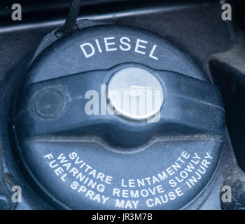 Close-up of a black plastic fuel filler cap of a diesel-powered car. Labeled 'Diesel'. Stock Photo