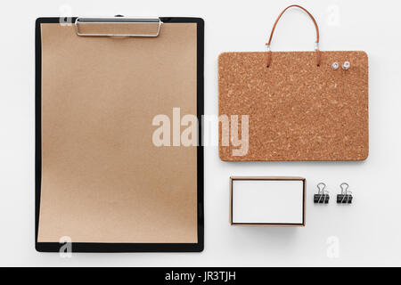 Eco stationary mockup clipboard with brown paper cork board and business card in box Stock Photo