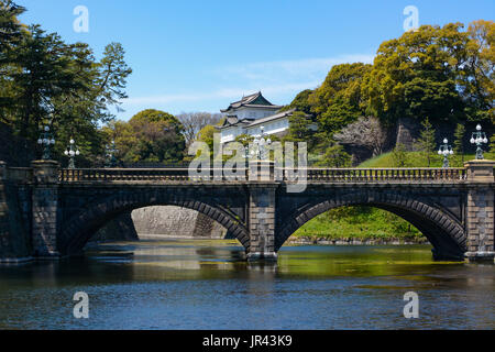 Historic Seimon Ishibashi Bridge and guard tower turret at Tokyo Imperial Palace in Japan Stock Photo