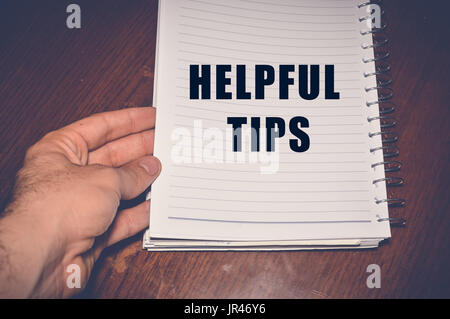 Helpful Tips written on white paper, business concept background Stock Photo